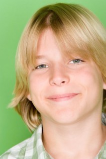 Studio shot portrait of teenage boy, close-up. Photo : Rob Lewine