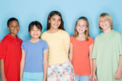 Studio shot portrait of five teenagers, waist up. Photo : Rob Lewine