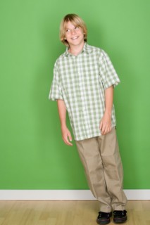 Studio shot portrait of teenage boy, full length. Photo : Rob Lewine