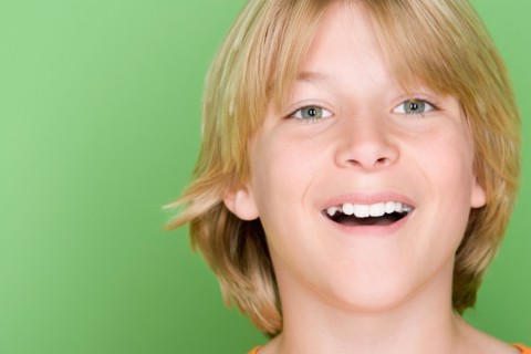 Studio shot portrait of teenage boy, close-up. Photo : Rob Lewine