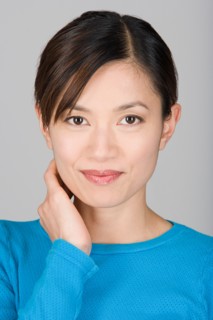 Studio shot portrait of mature woman, head and shoulders. Photo : Rob Lewine