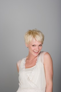 Studio portrait of seductive mid adult woman. Photo : Rob Lewine
