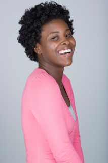 Studio portrait of confident mid adult woman. Photo : Rob Lewine