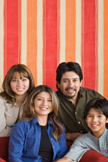 Portrait of smiling family. Photo : Rob Lewine