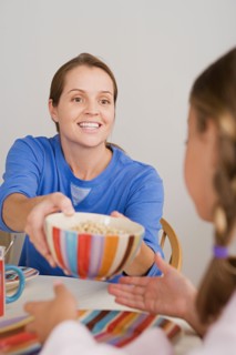 Mother and daughter having breakfast. Photo : Rob Lewine