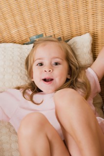 Portrait of playful girl. Photo : Rob Lewine