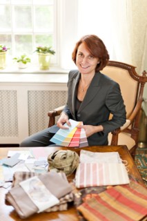 Woman checking color samples. Photo : Elena Elisseeva