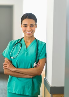 Portrait of female nurse in hospital.