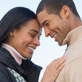 Portrait of couple embracing.