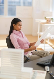 Female architect in office.
