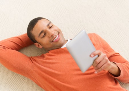 Man reading e-book.