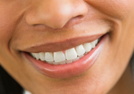 Close-up of woman's perfect teeth.
