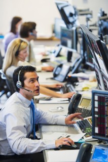 Traders at trading desk.