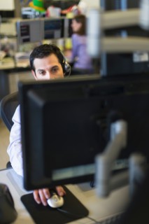 Traders at trading desk.