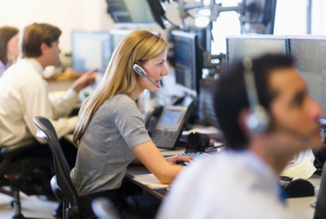 Traders at trading desk.