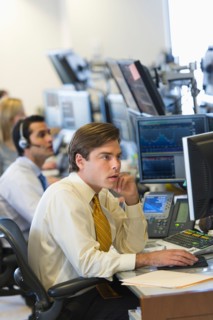 Traders at trading desk.