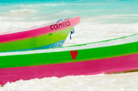 Colorful boats on beach.