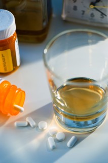 Pills and alcohol, studio shot.