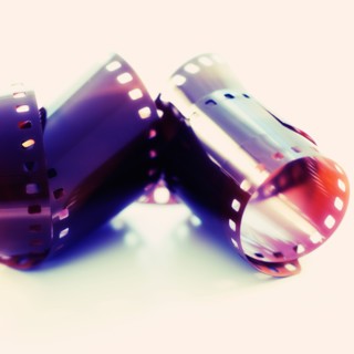 Studio shot of 35 mm film reel.