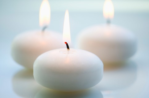 Close-up of white candles.