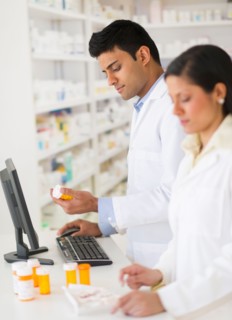 Two pharmacists in pharmacy.