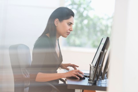 Businesswoman working on computer.