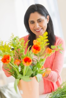 Woman receiving bouquet.