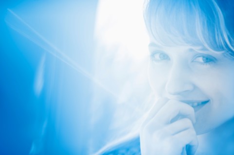 Woman in blue light.
