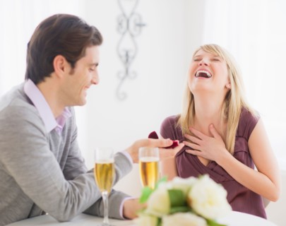 Couple celebrating engagement in restaurant. Photo : Daniel Grill
