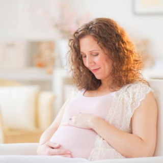 Portrait of pregnant woman. Photo : Daniel Grill