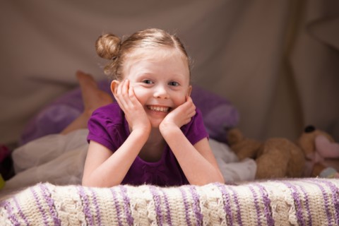 Portrait of happy girl (4-5). Photo : Mike Kemp