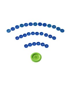 Studio shot of blue and green buttons. Photo : David Arky