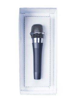 Studio shot of unplugged microphone still in box. Photo : David Arky