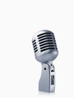 Studio shot of vintage-themed modern microphone on white background. Photo : David Arky