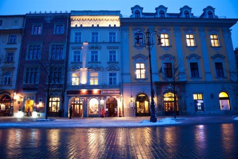 Poland, Krakow. Historic houses in main Square. Photo : Henryk Sadura