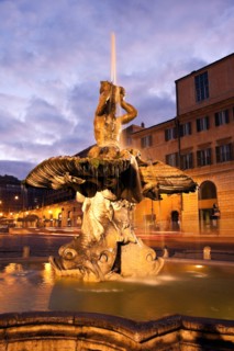 Italy, Rome. Piazza Barberini, Fountain of the Triton in early morning. Photo : Henryk Sadura