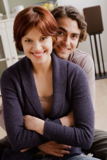 Portrait of smiling couple. Photo : Rob Lewine