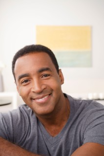 Portrait of smiling mature man. Photo : Rob Lewine