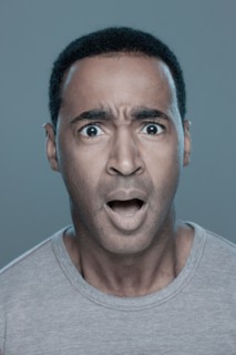 Studio shot of shocked man. Photo : Rob Lewine