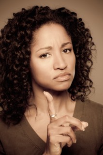 Studio shot of displeased mid adult woman. Photo : Rob Lewine