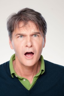 Studio shot of shocked mid adult man. Photo : Rob Lewine