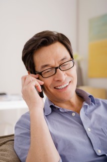 Man talking on phone. Photo : Rob Lewine