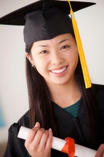 Portrait of graduated young woman. Photo : Rob Lewine
