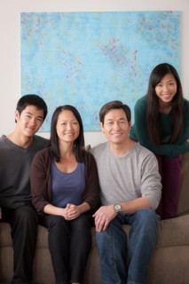 Portrait of smiling family. Photo : Rob Lewine
