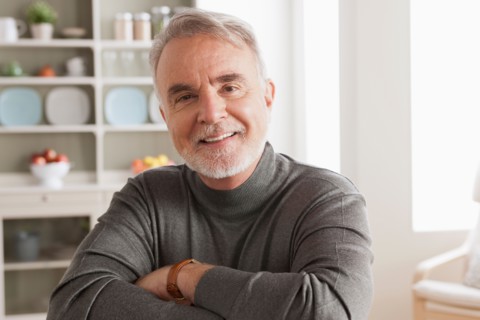 Portrait of smiling senior man. Photo : Rob Lewine