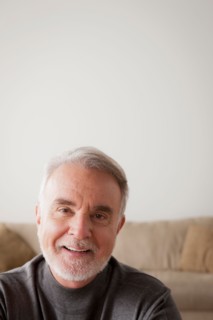 Portrait of smiling senior man. Photo : Rob Lewine