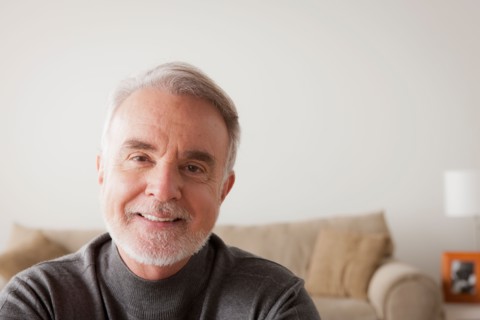 Portrait of smiling senior man. Photo : Rob Lewine