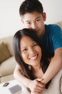 Son embracing mother. Photo : Rob Lewine