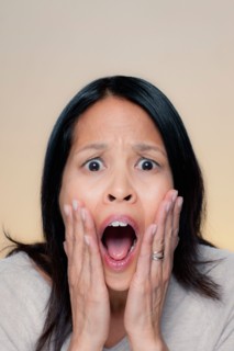 Portrait of woman with astonished expression. Photo : Rob Lewine