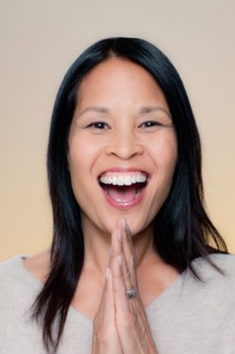 Portrait of laughing woman. Photo : Rob Lewine